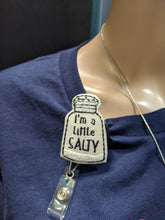 Load image into Gallery viewer, &quot;I&#39;m a Little Salty&quot; Badge Reel Buddies
